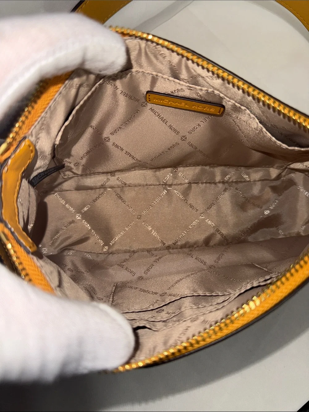 Michael Kors details logo